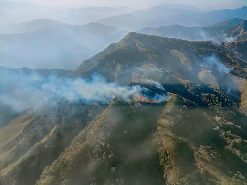 ON MONDAY, JAN. 04, 2021**Kohima: Smoke rises during a forest fire that broke out in the Dzukou Valley of Kohima district. (PTI Photo) (PTI Photo)
